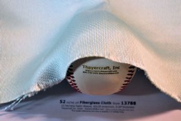 Heavy satin weave fiberglass cloth style 13788 shaped around baseball