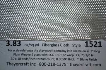 3.83 oz Warp Weave fiberglass cloth close up with Construction Data