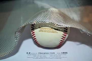 Style 1800 fiberglass cloth shaped around baseball 
