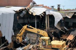 Steve Thayer doing demolition old Alma Desk finish line bldg